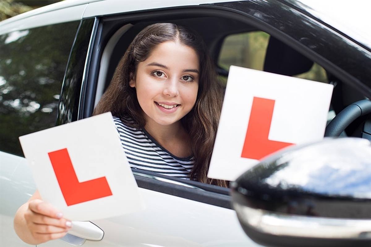 Learner driver with L plates starting a Sydney South Driving School lesson